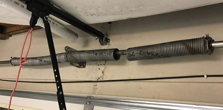 Broken garage door spring repair Trumbull